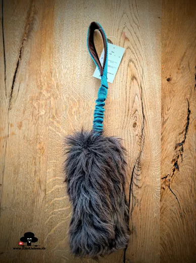 Sheepskin brown fur tug toy with bungee handle