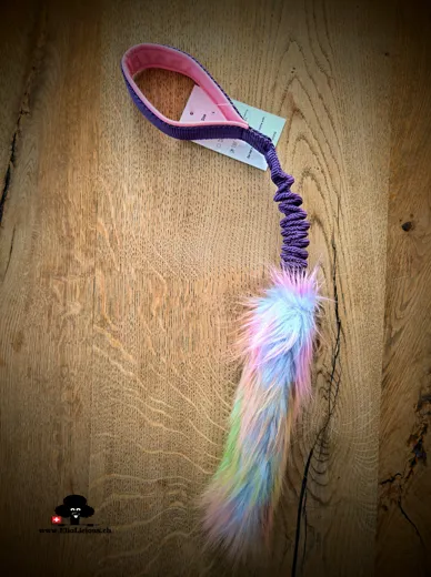 Faux fur rainbow tug toy with bungee handle purple