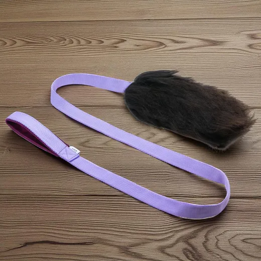 Sheepskin brown fur tug toy with handle on long webbing 