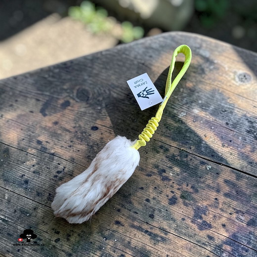 Sheepskin Mouflon fur (mix brown and white) tug toy with bungee handle neon yellow S