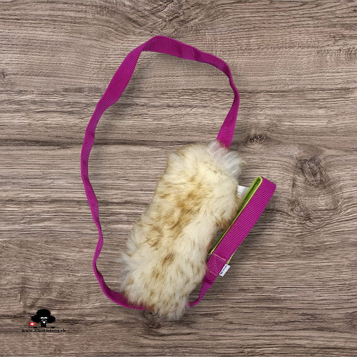 Sheepskin mouflon fur tug toy withhandle on long webbing pink 
